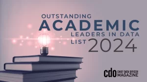 A lit lightbulb atop a stack of books next to the words 'Outstanding Academic Leaders in Data List 2024, CDO Chief Data Officer Magazine