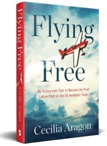 Image of a book titled 'Flying Free' which has a red plane on a sky