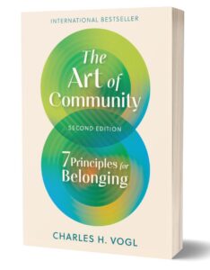 A white book cover with two green circles on it and the text International Bestseller The Art of Community Second Edition 7 Principles for Belonging Charles H. Vogl