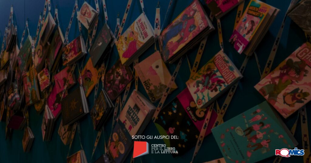 A dark image of a stack of comic books